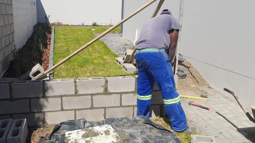 assured home painters and construction doing paving in Langebaan