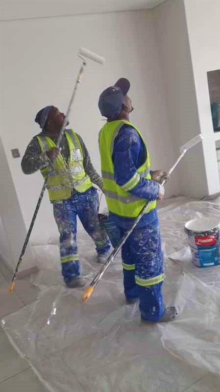 assured home painters company doing house interior painting